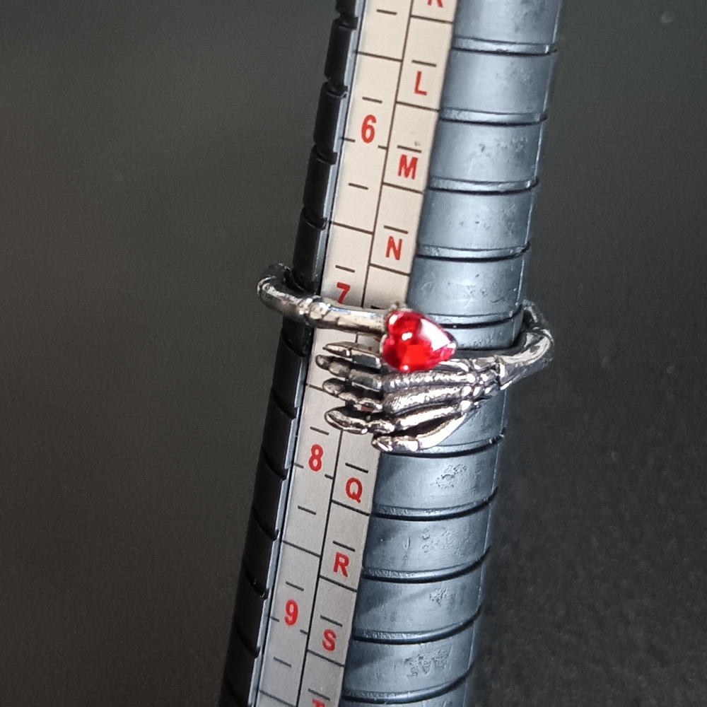 Skeleton Hand Ring with Red Heart Gem (NEW)